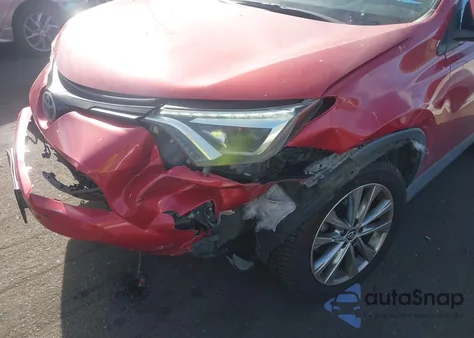 2016 Toyota Rav4 Limited z USA, uszkodzony, nr VIN 2T3DFREV0GW447099